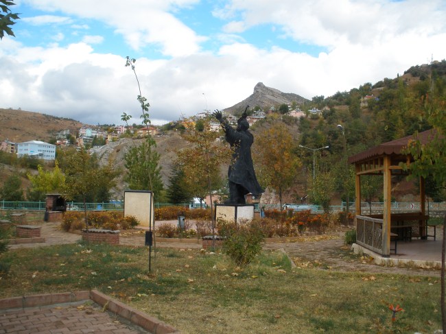 Pir Sultan Abdal statue at Tunceli looking towards town